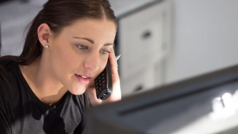 Psychiatrist accepting new patients – a receptionist on the phone scheduling a mental health appointment